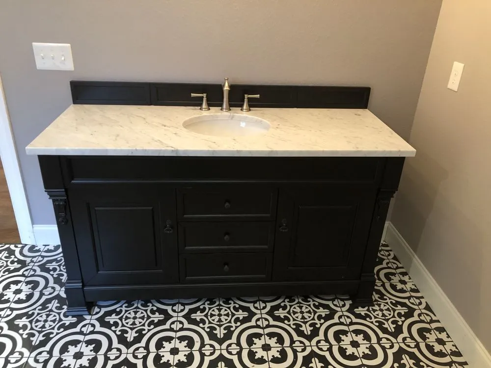 Slide of New Age Construction + Design