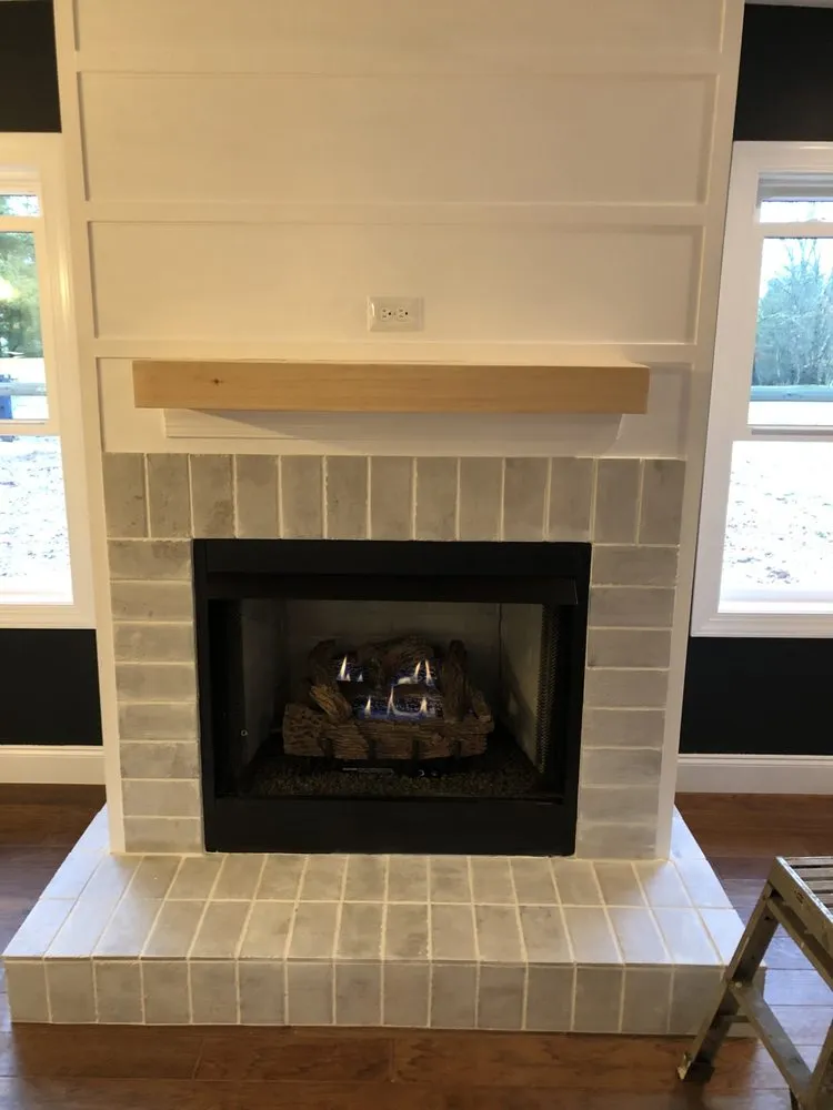 Slide of New Age Construction + Design