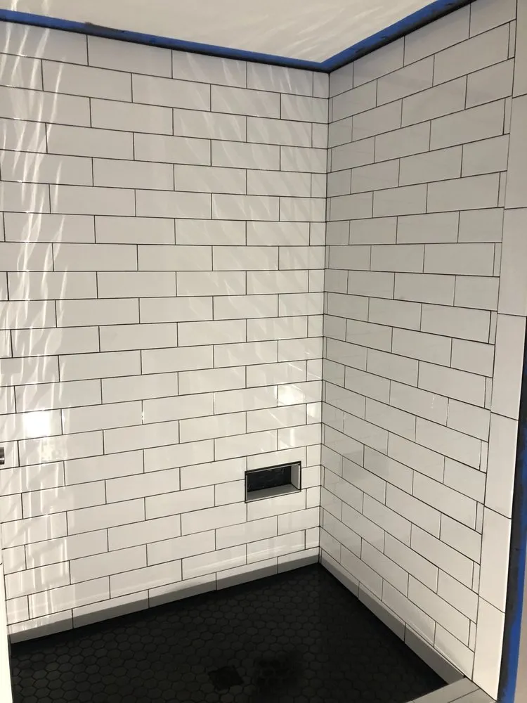 Slide of New Age Construction + Design