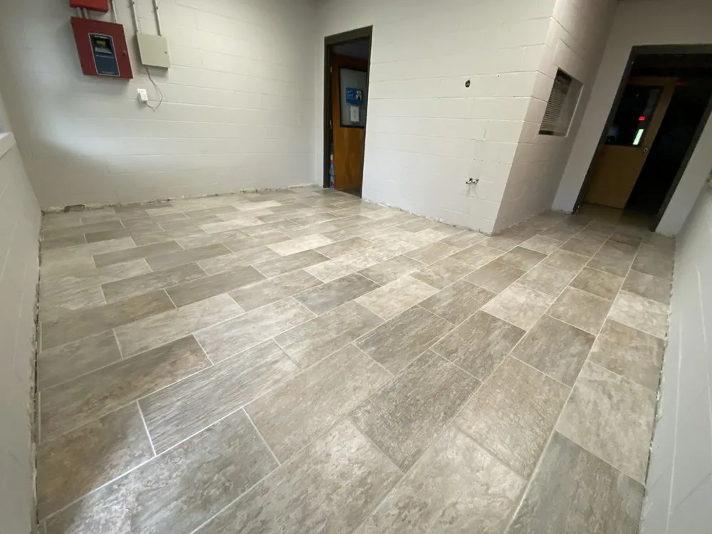 Slide of New Age Construction + Design