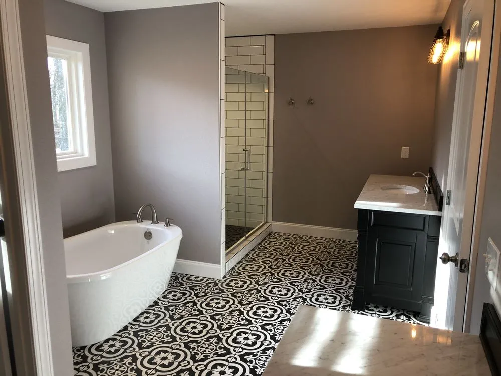 Slide of New Age Construction + Design