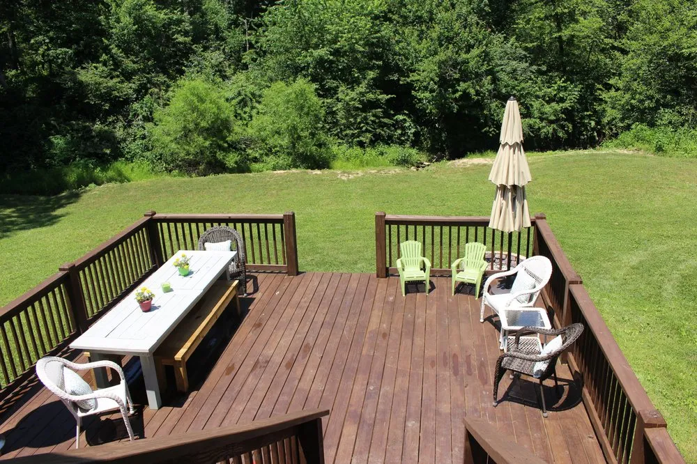 Slide of New Age Construction + Design