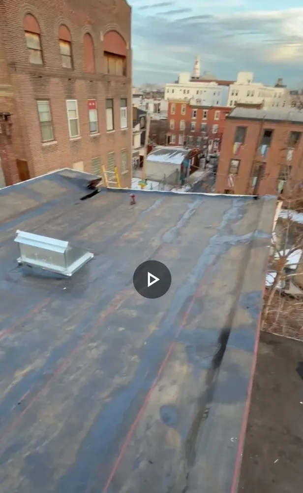 Slide of New Dynasty Roofing