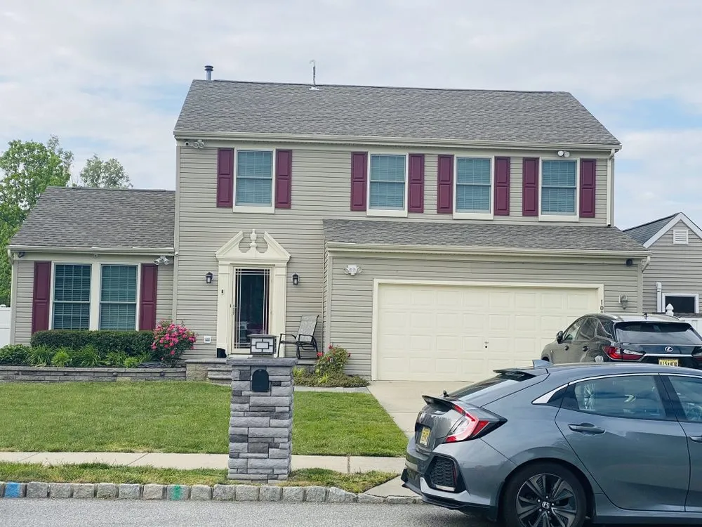 Slide of New Dynasty Roofing