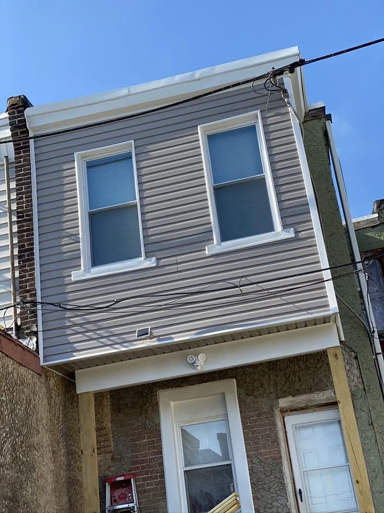 Slide of New Dynasty Roofing