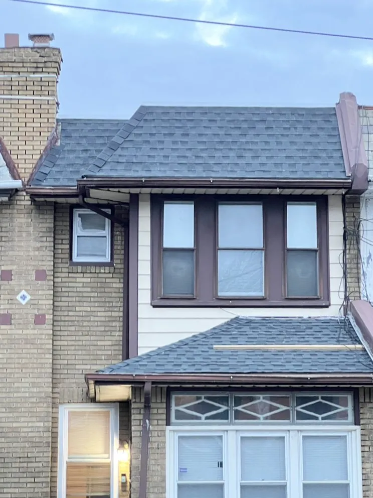 Slide of New Dynasty Roofing