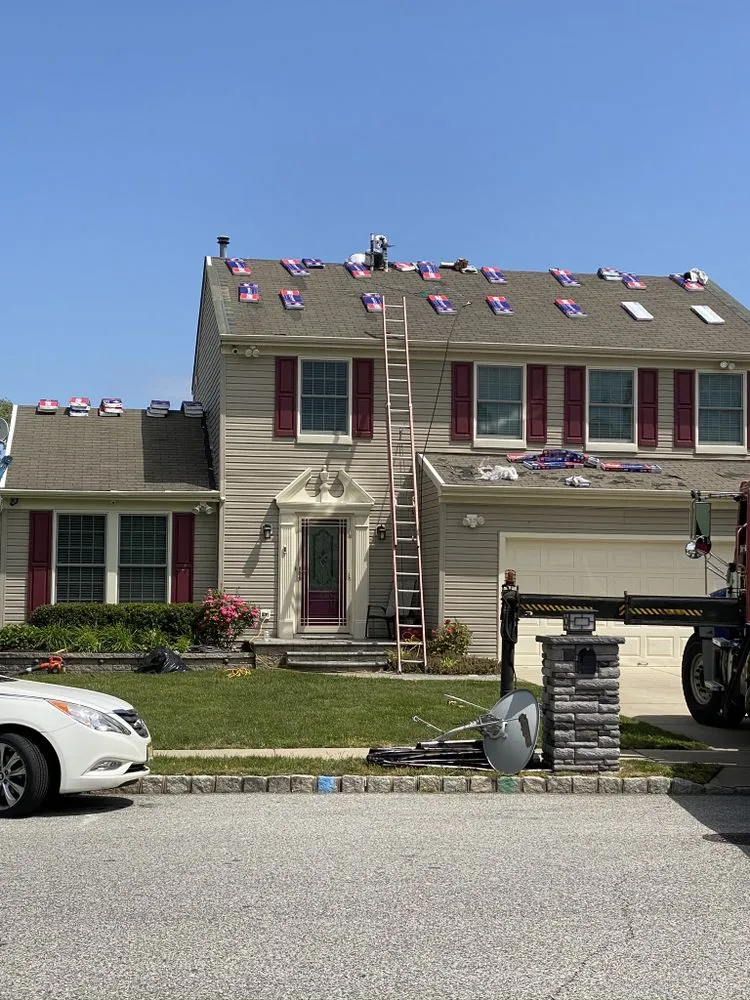 Slide of New Dynasty Roofing