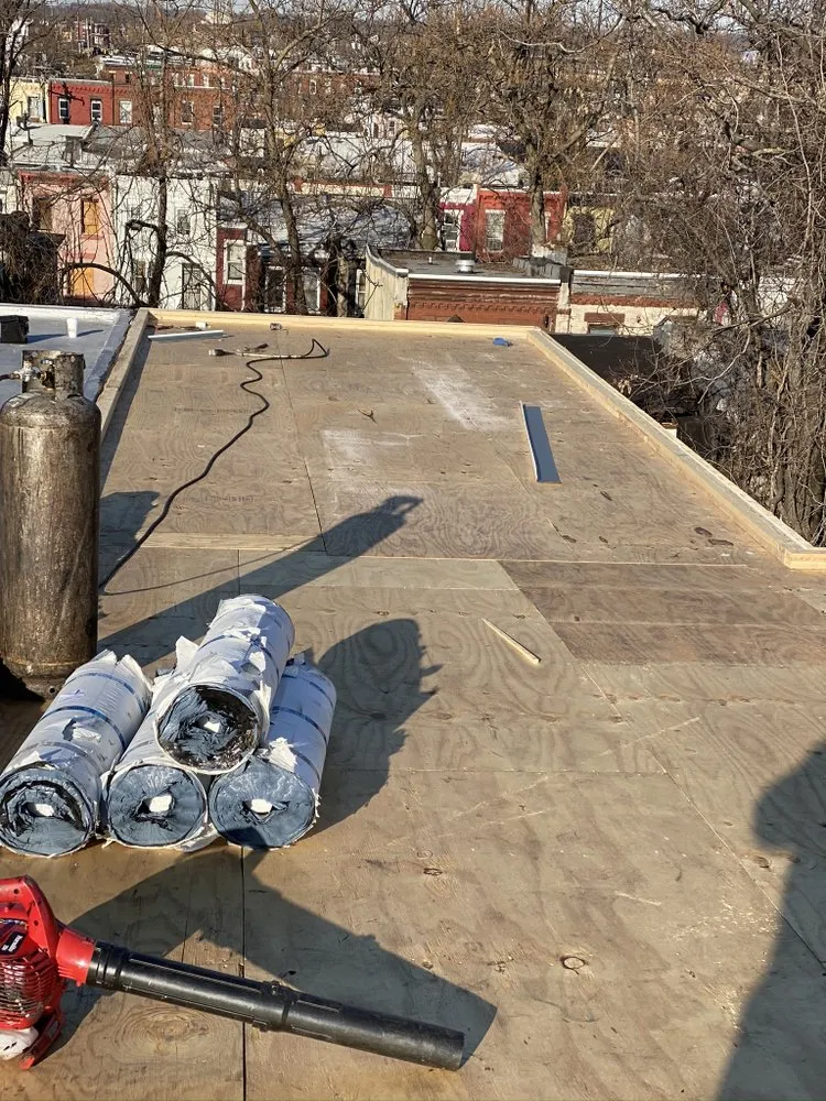 Slide of New Dynasty Roofing