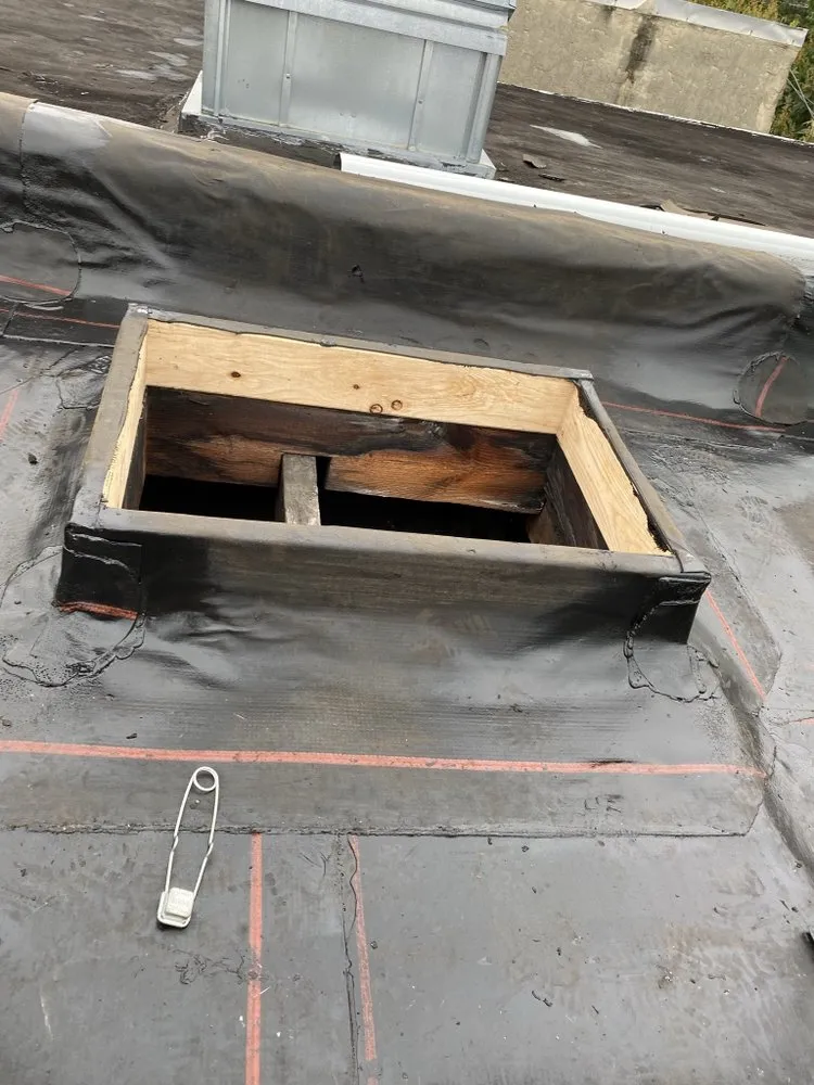 Slide of New Dynasty Roofing