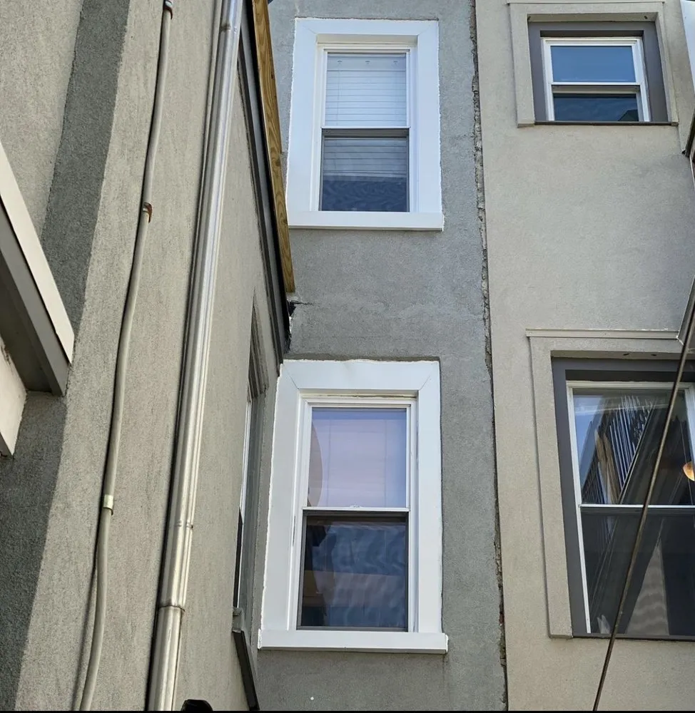 Slide of New Dynasty Roofing