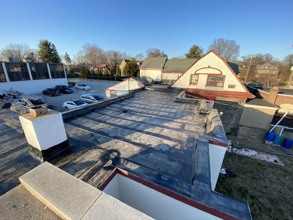 Slide of New Dynasty Roofing