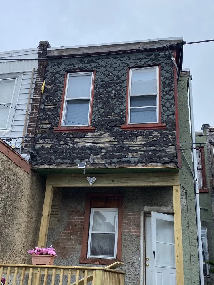 Slide of New Dynasty Roofing