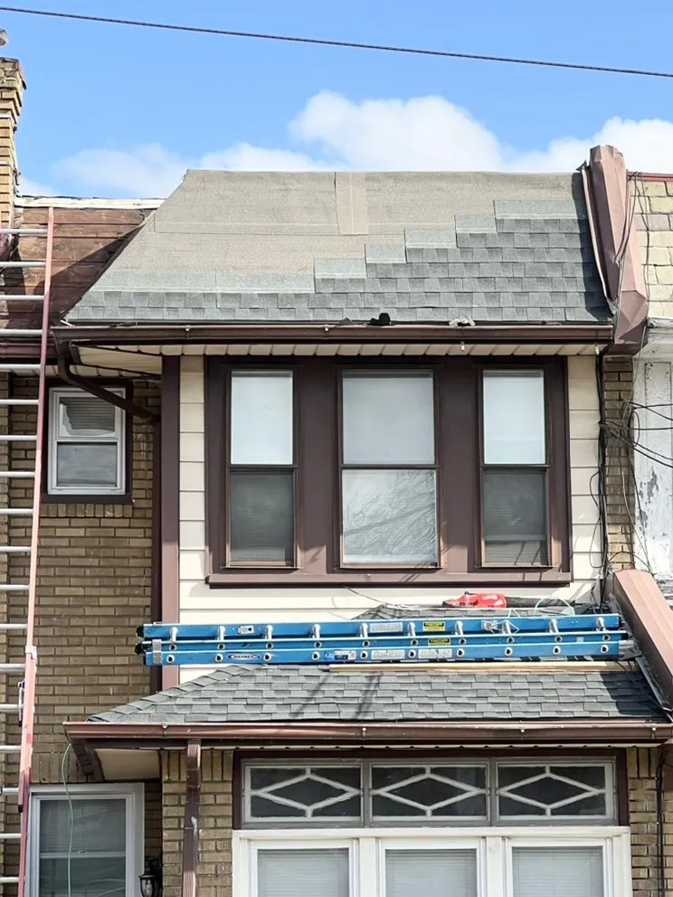 Slide of New Dynasty Roofing