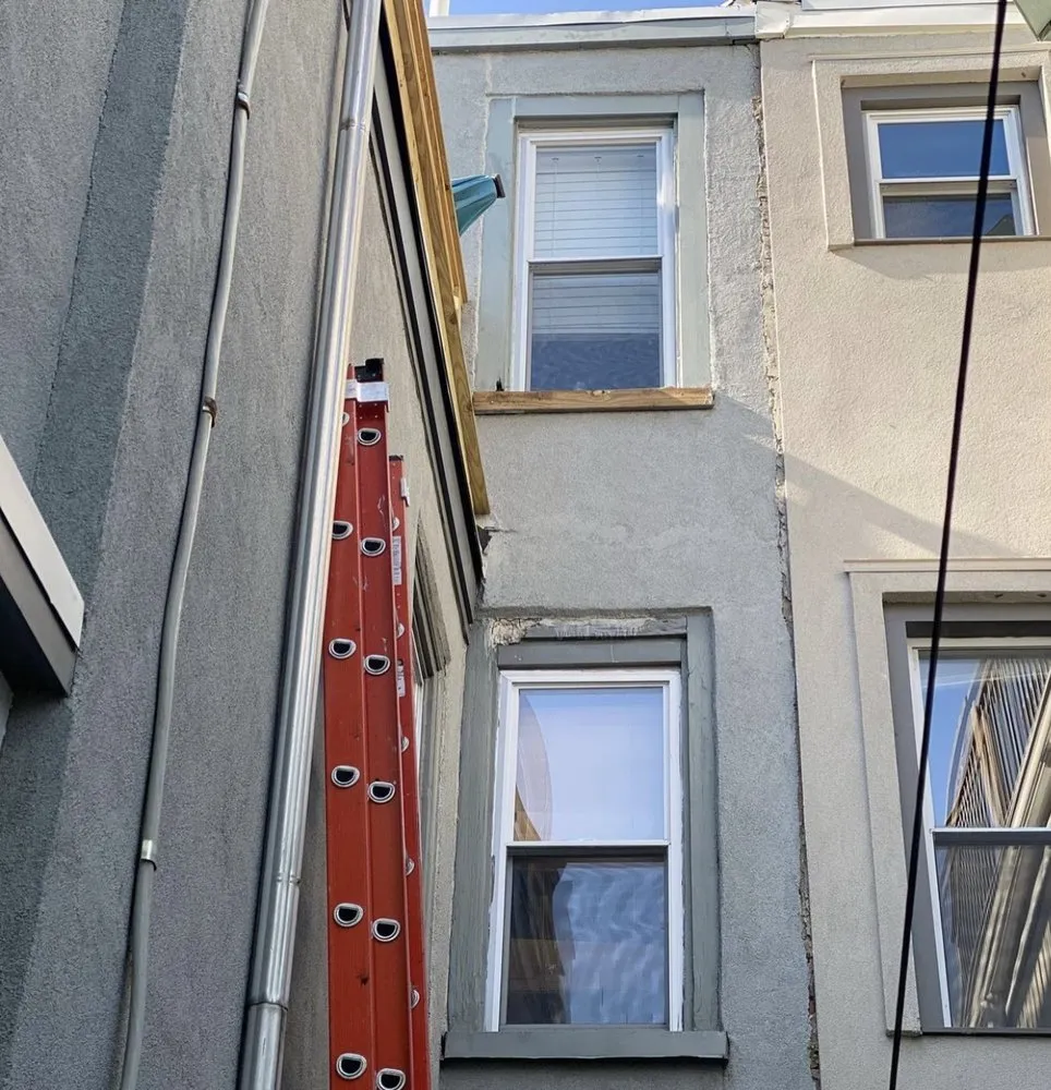 Slide of New Dynasty Roofing