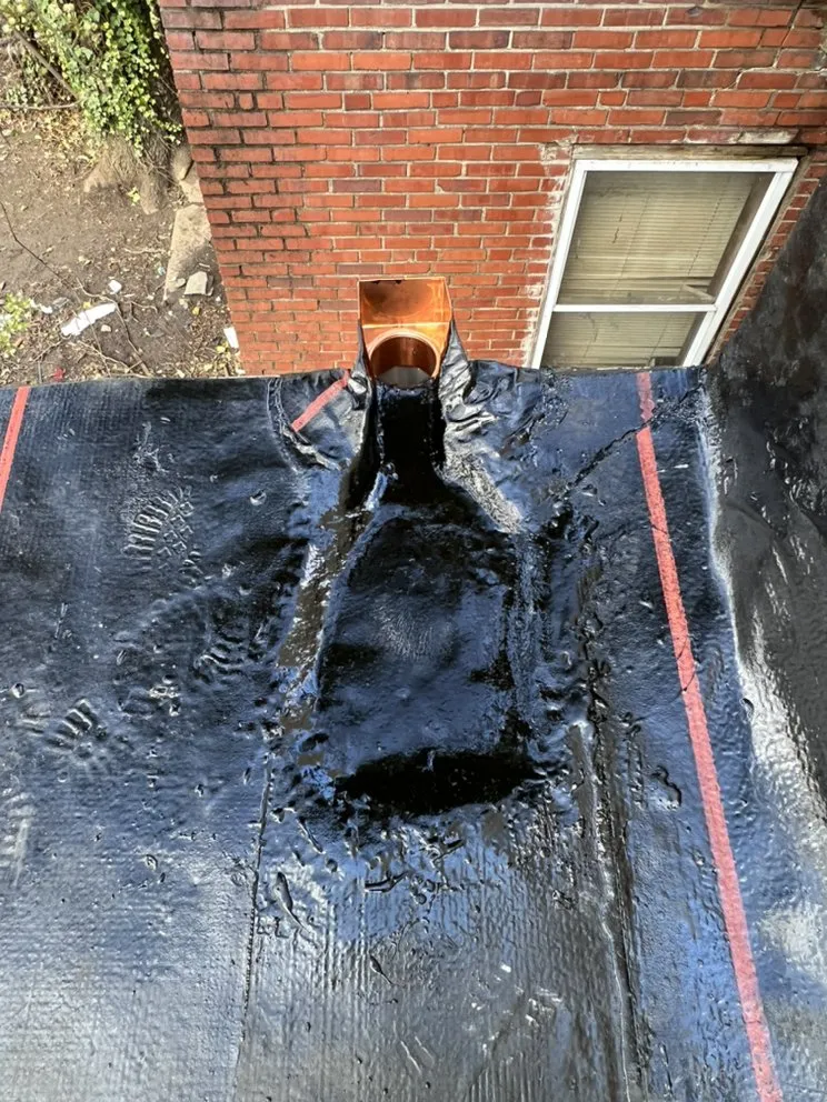 Slide of New Dynasty Roofing