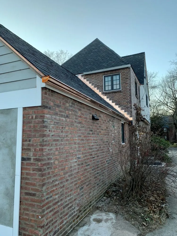 Slide of New England Roofing & Home Repair