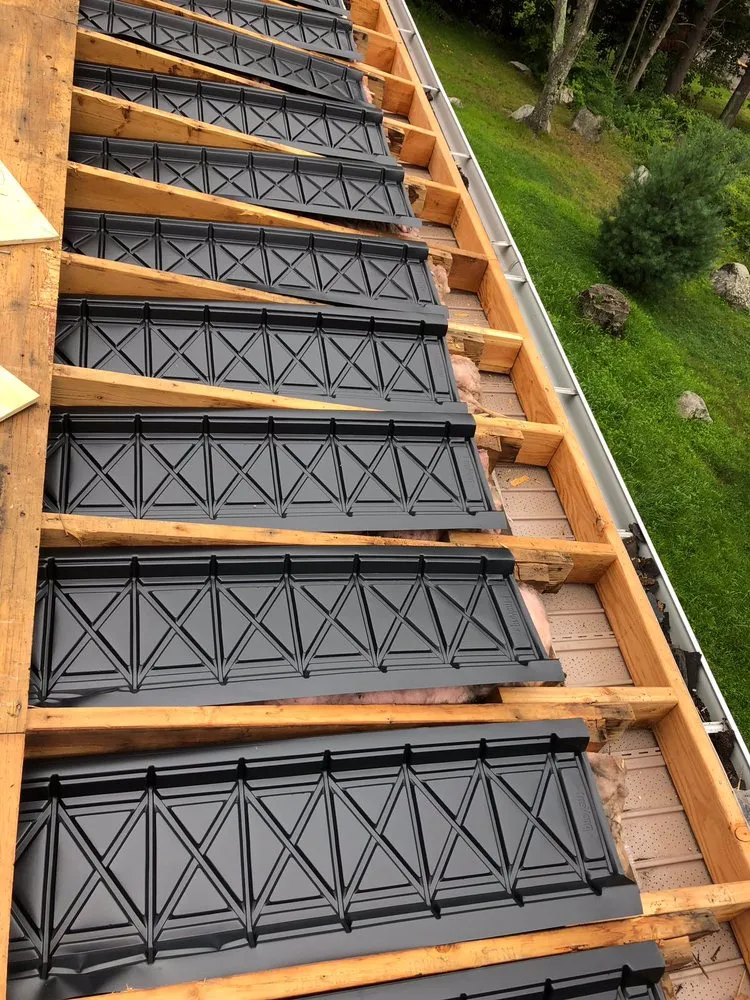 Slide of New England Roofing & Home Repair