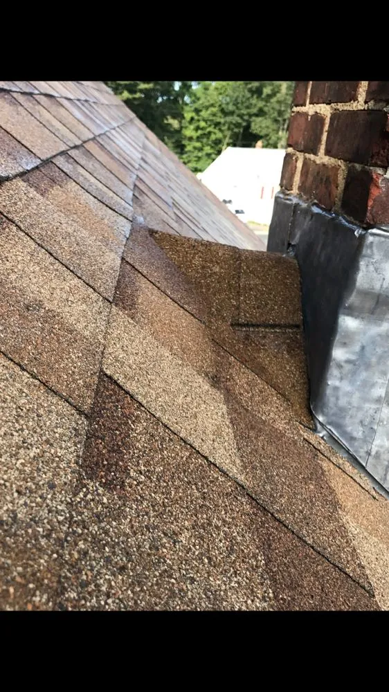 Slide of New England Roofing & Home Repair