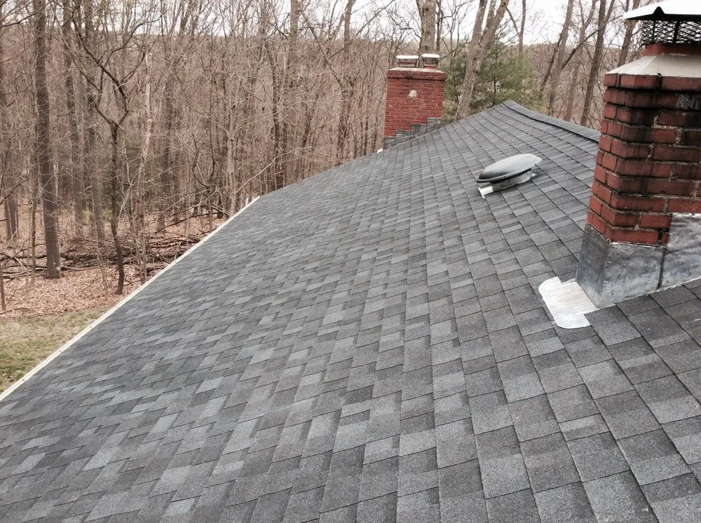 Slide of New England Roofing & Home Repair