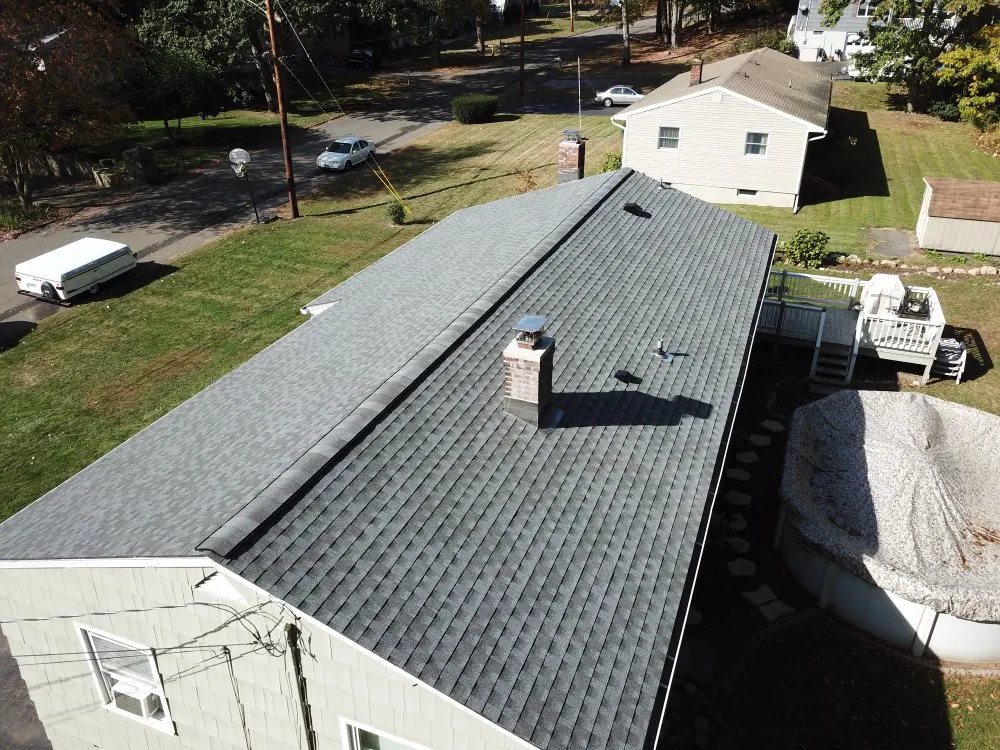 Slide of New England Roofing & Home Repair