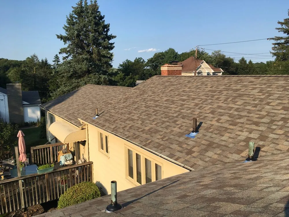 Slide of New England Roofing & Home Repair