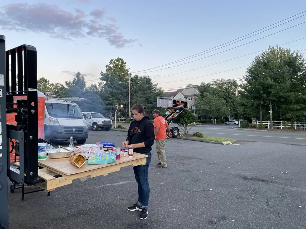 Slide of New England Roofing & Home Repair