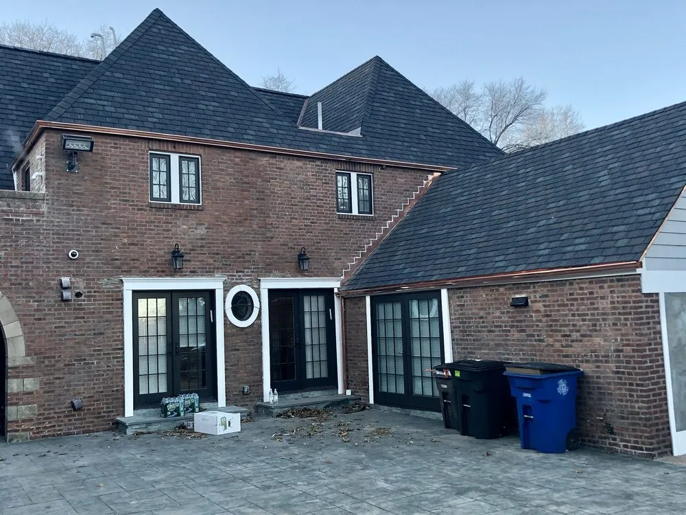 Slide of New England Roofing & Home Repair