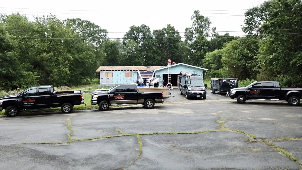 Slide of New England Roofing & Home Repair