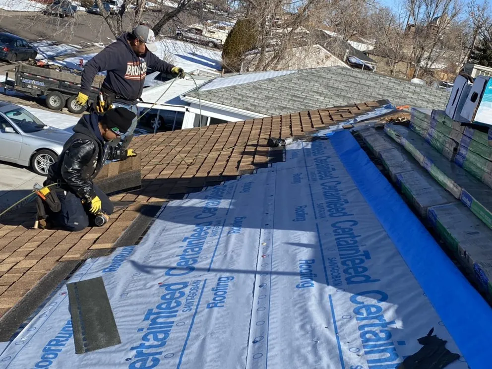 Slide of New Era Roofing & Restoration