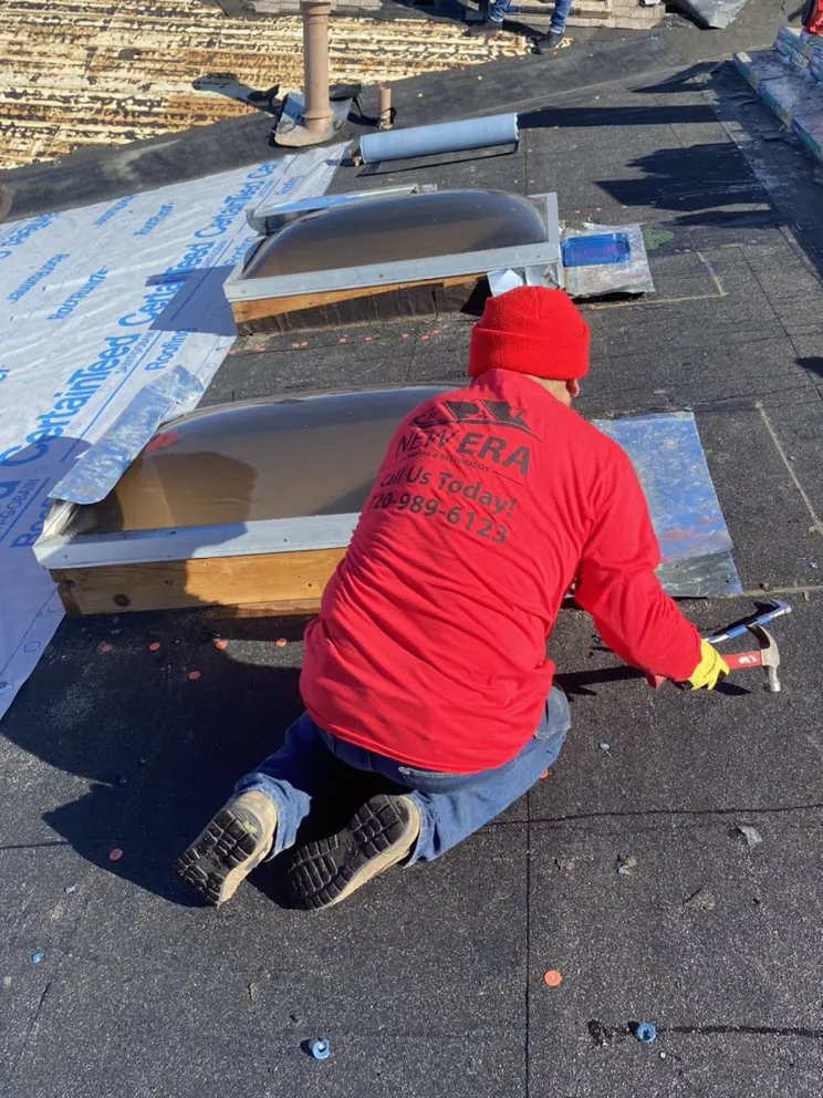 Slide of New Era Roofing & Restoration