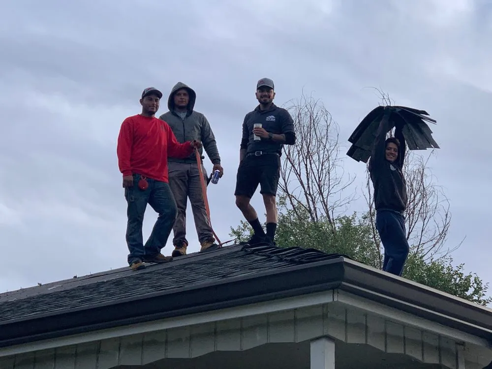 Slide of New Era Roofing & Restoration