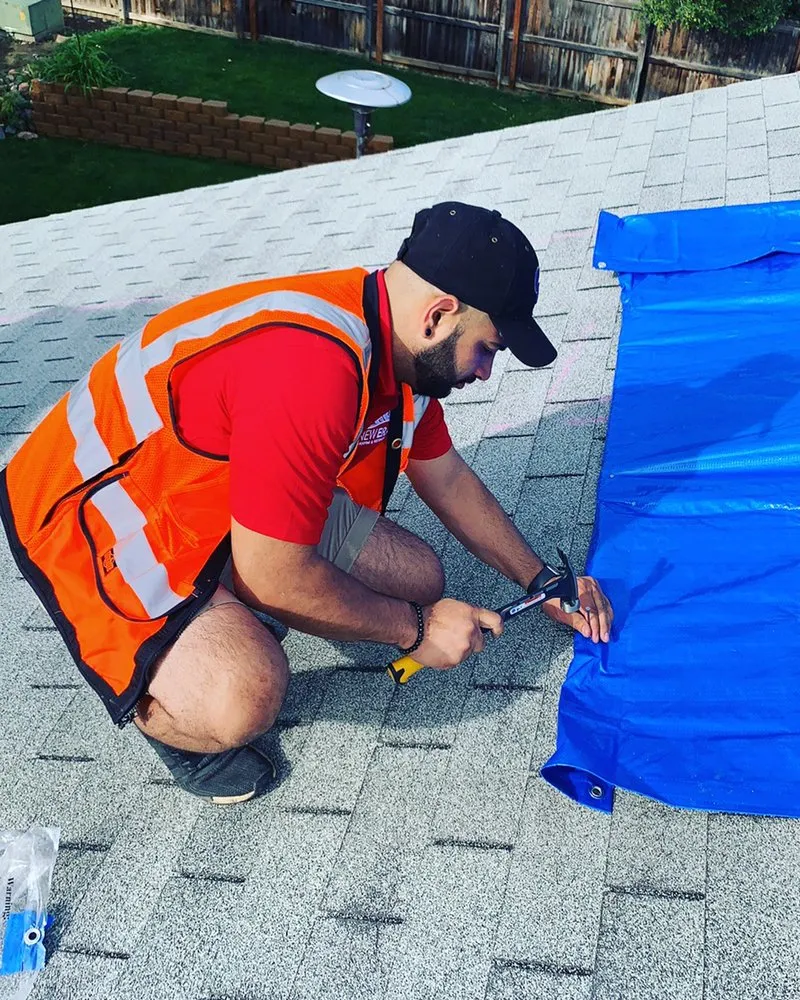 Slide of New Era Roofing & Restoration