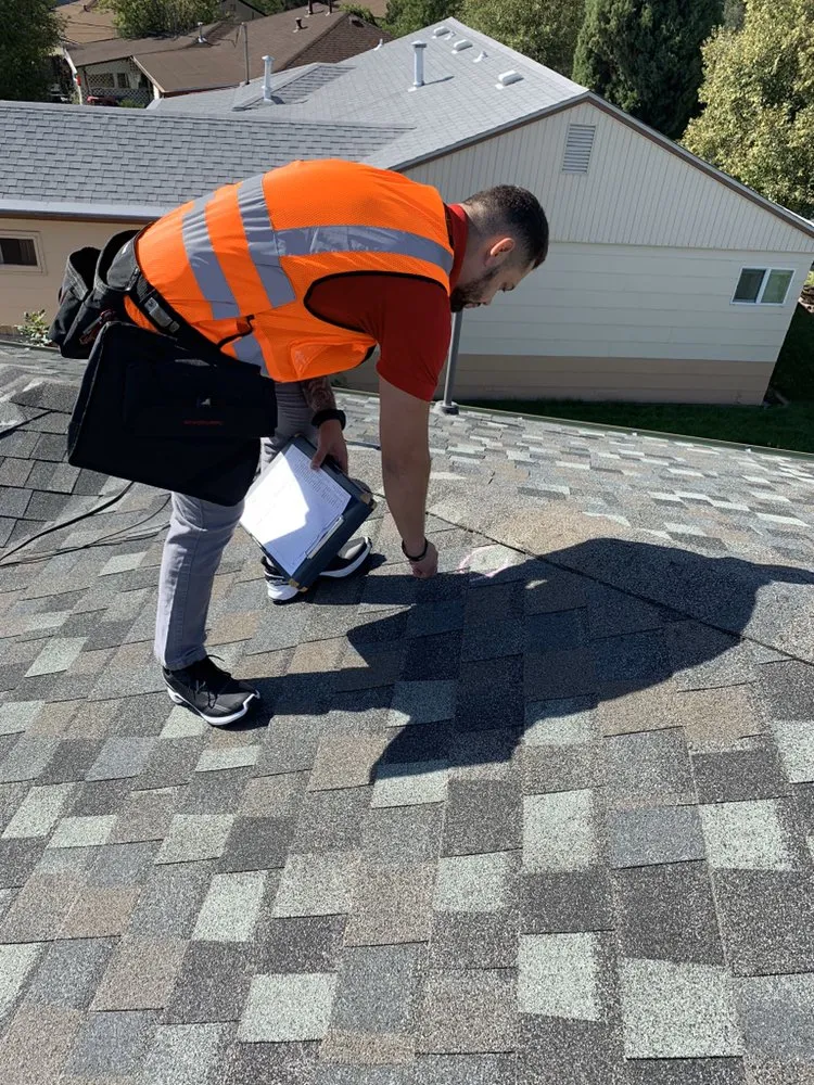 Slide of New Era Roofing & Restoration