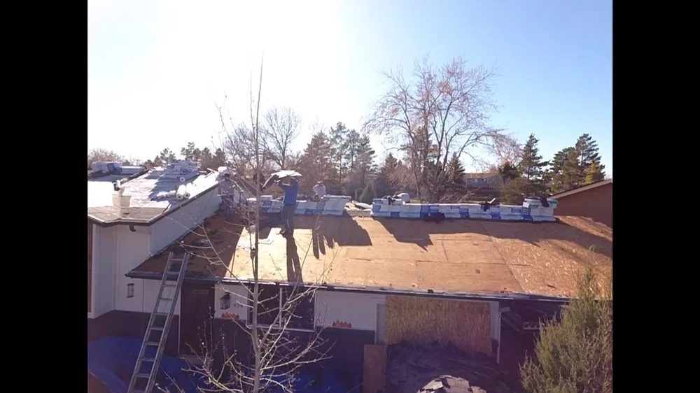 Slide of New Era Roofing & Restoration