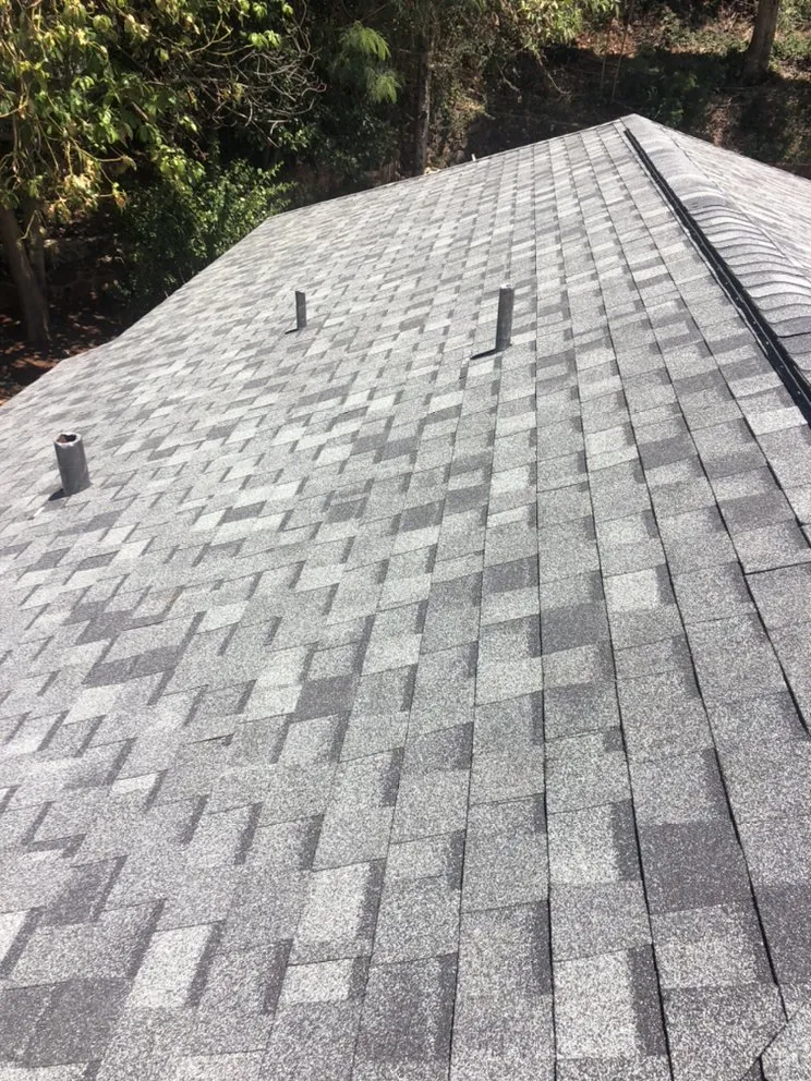 Slide of New Era Roofing