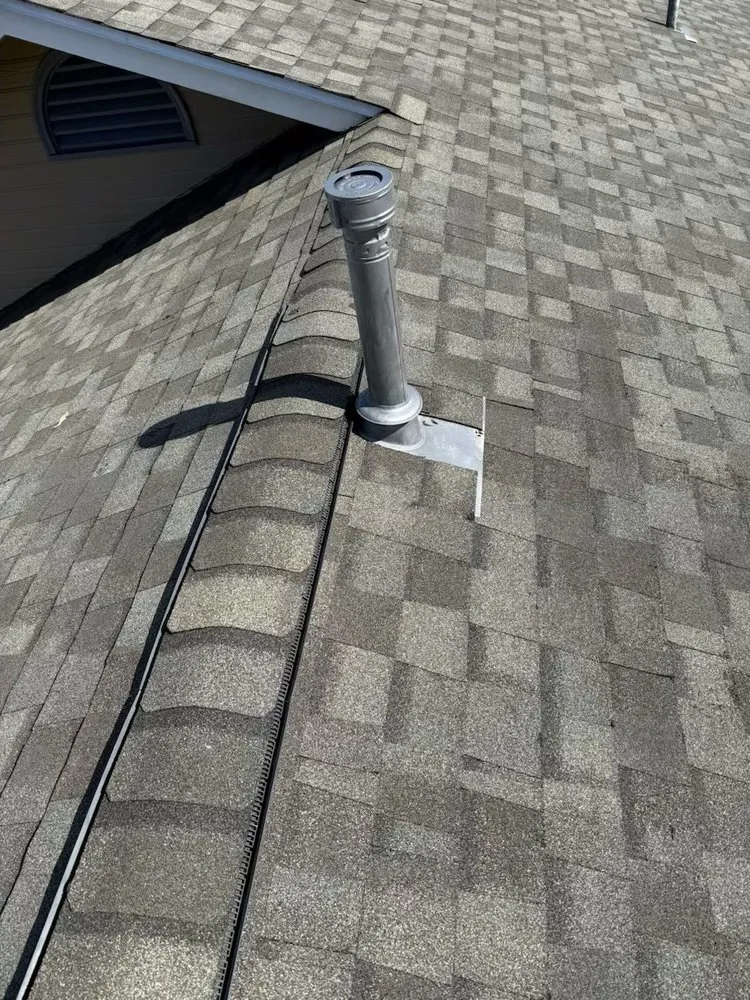 Slide of New Era Roofing