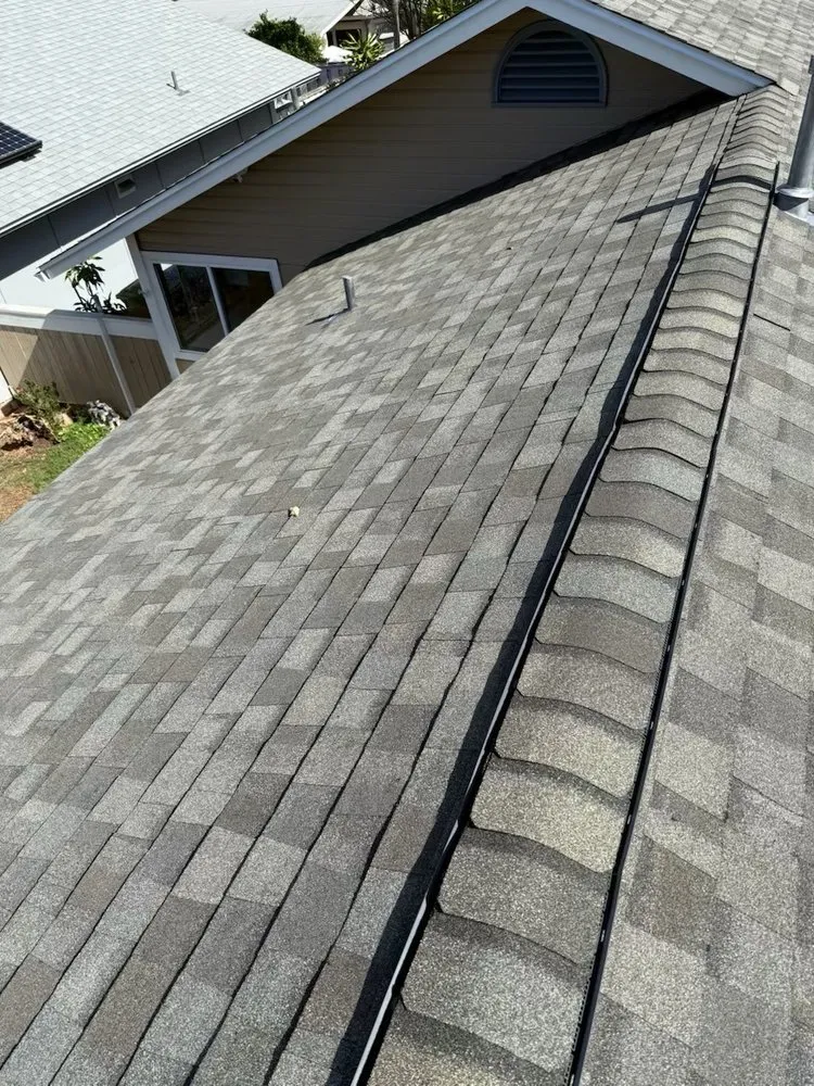 Slide of New Era Roofing