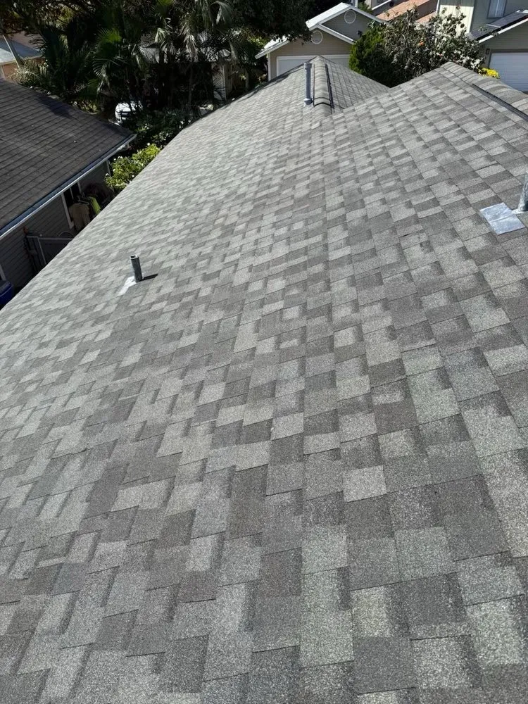 Slide of New Era Roofing