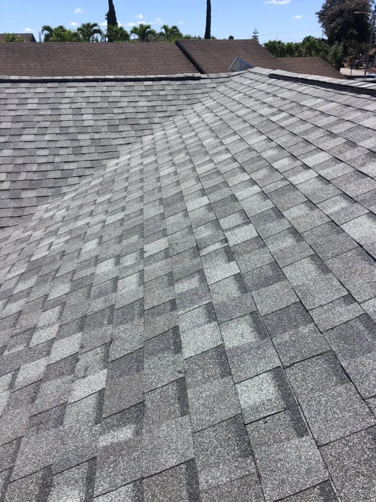 Slide of New Era Roofing