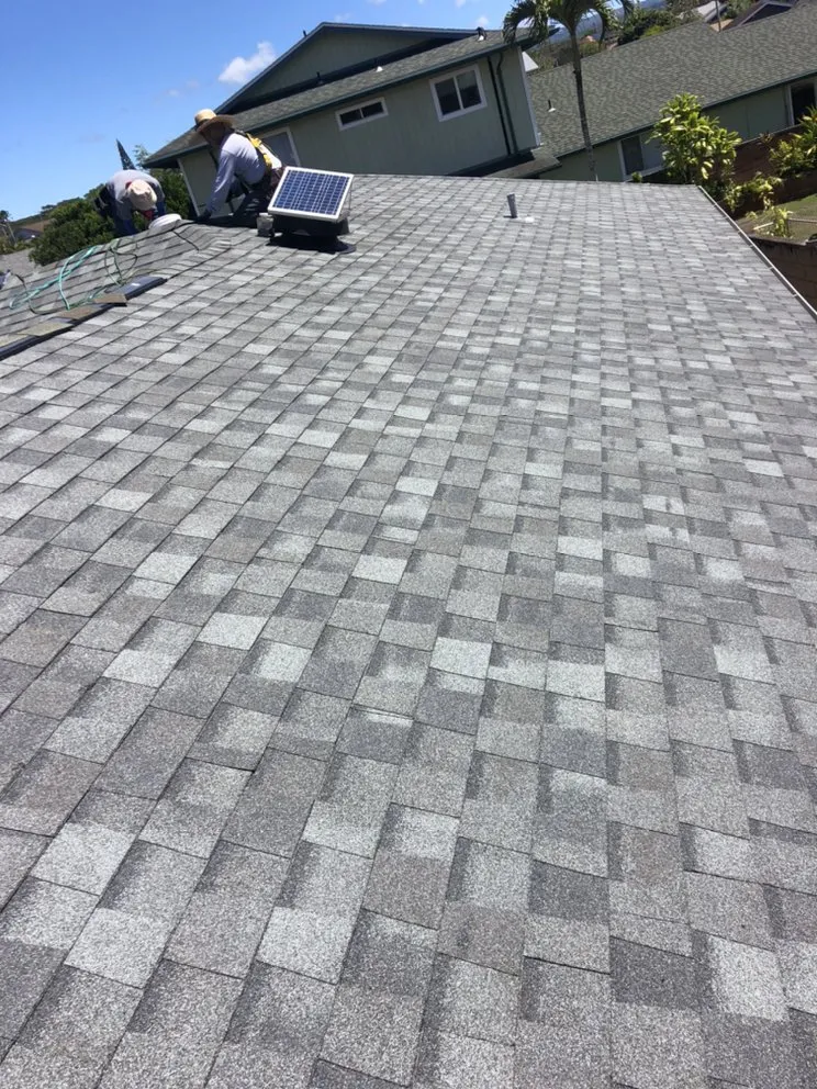 Slide of New Era Roofing