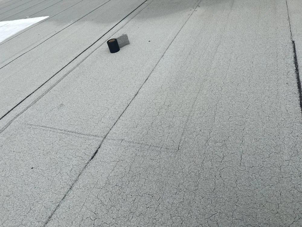 Slide of New Era Roofing