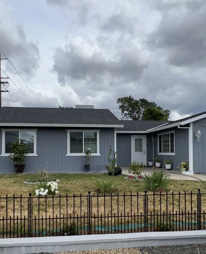 Slide of New Era Roofing