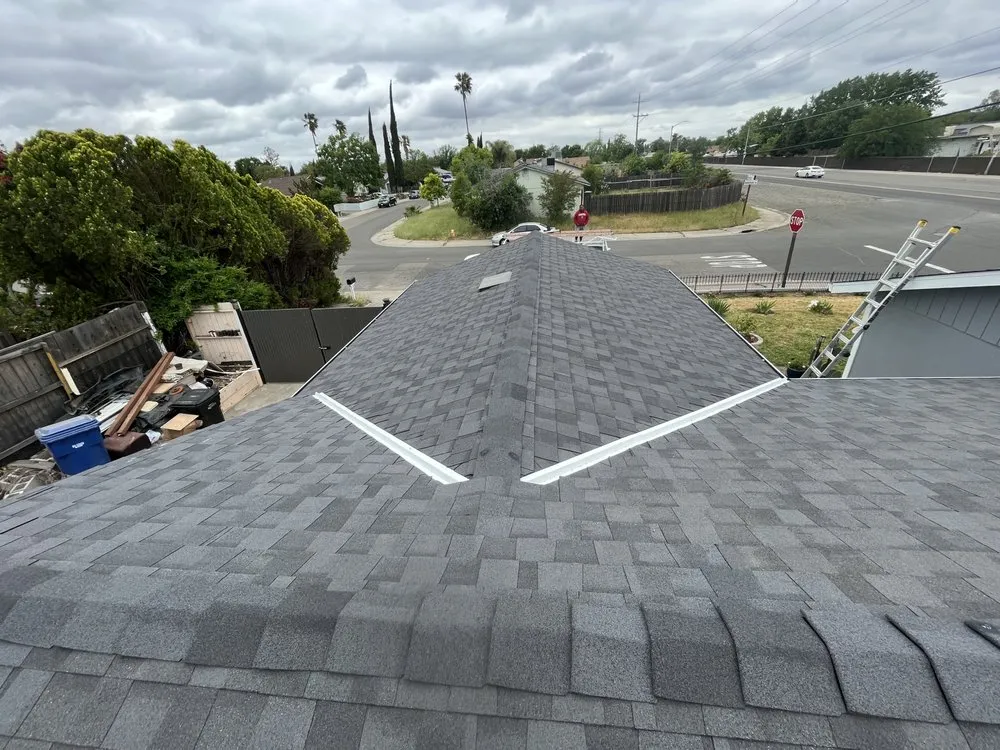 Slide of New Era Roofing