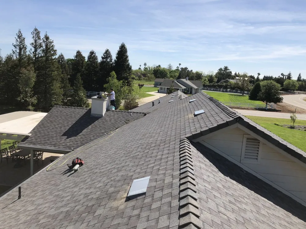 Slide of New Era Roofing