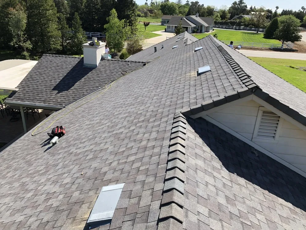 Slide of New Era Roofing