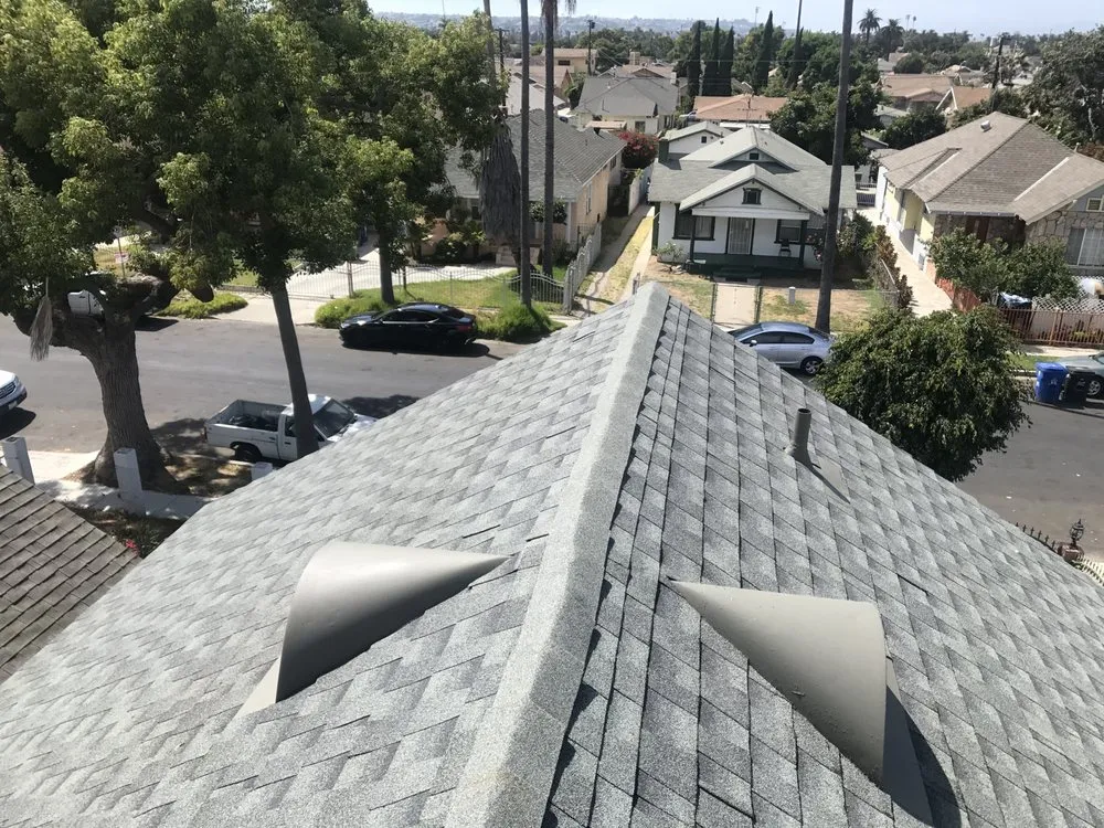 Slide of New Era Skilled Roofing