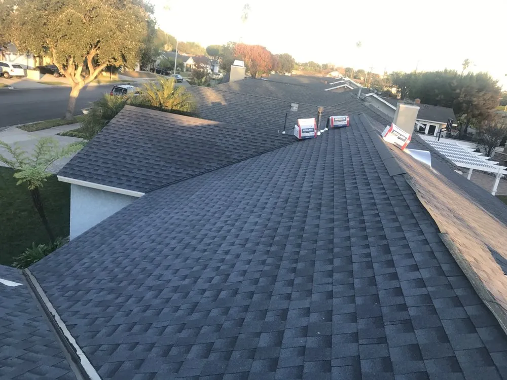 Slide of New Era Skilled Roofing
