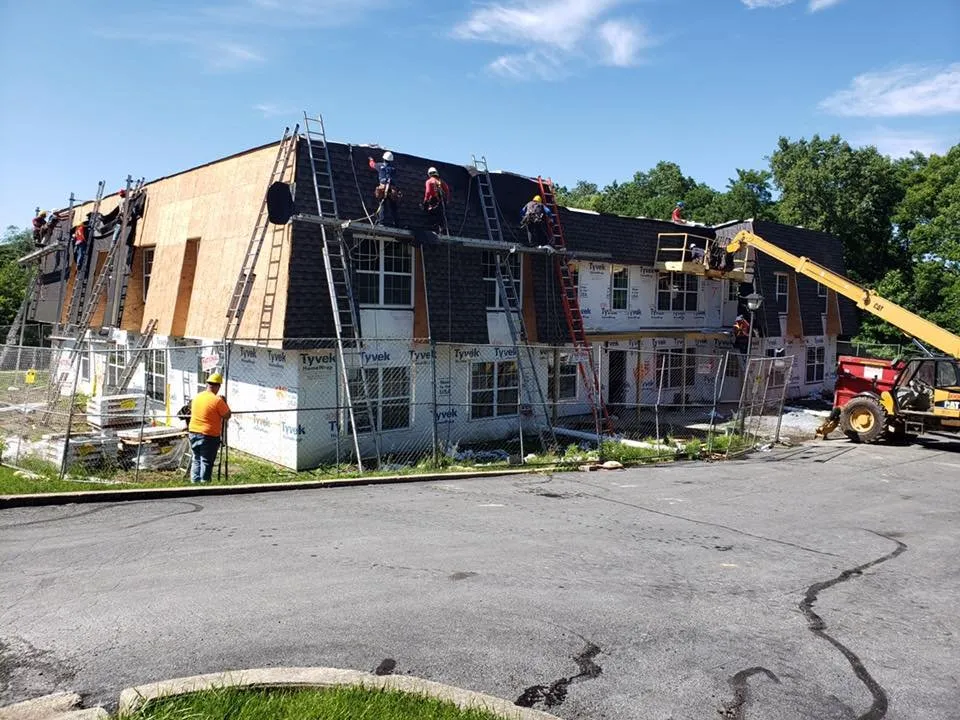 Slide of New Heights Roofing