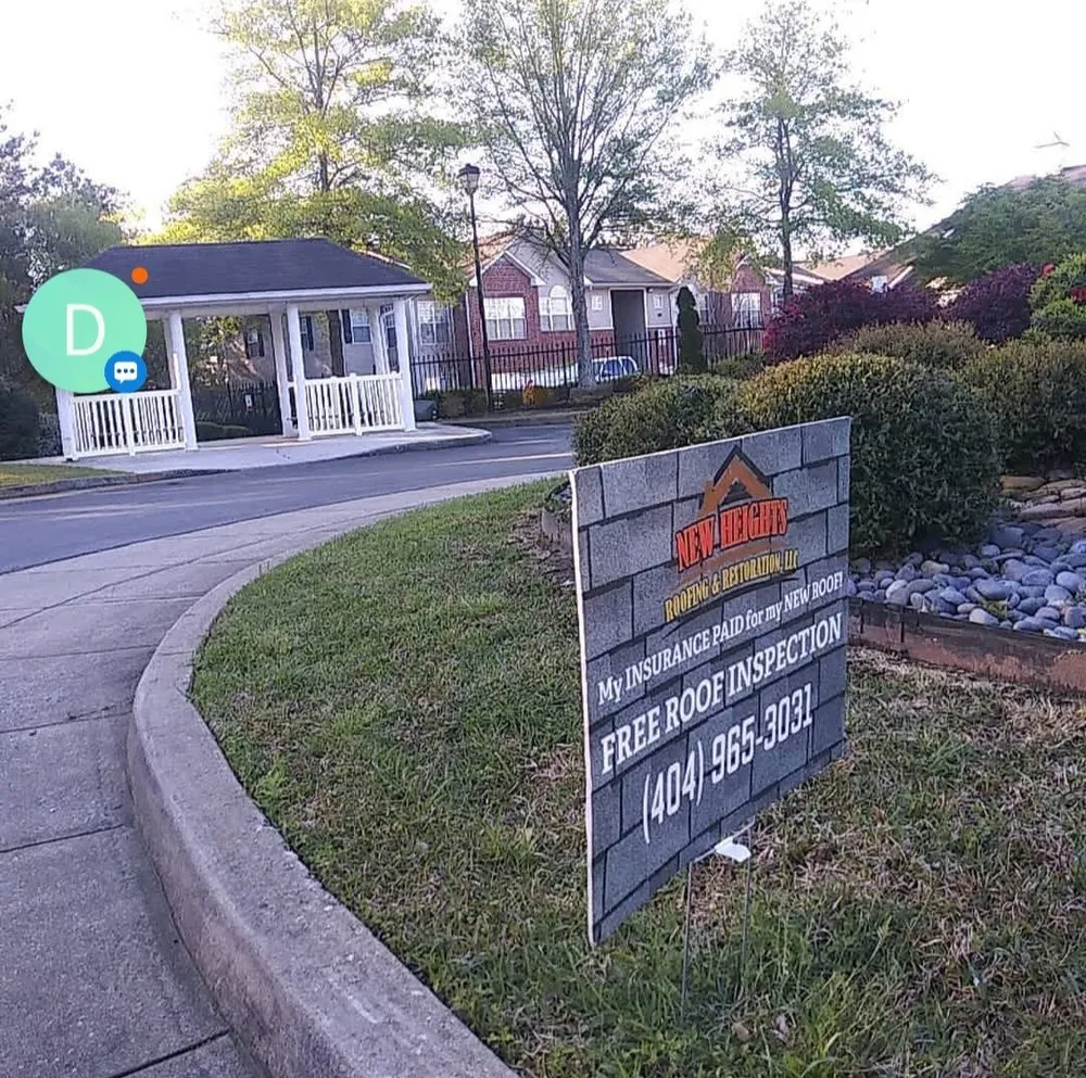 Slide of New Heights Roofing and Restoration