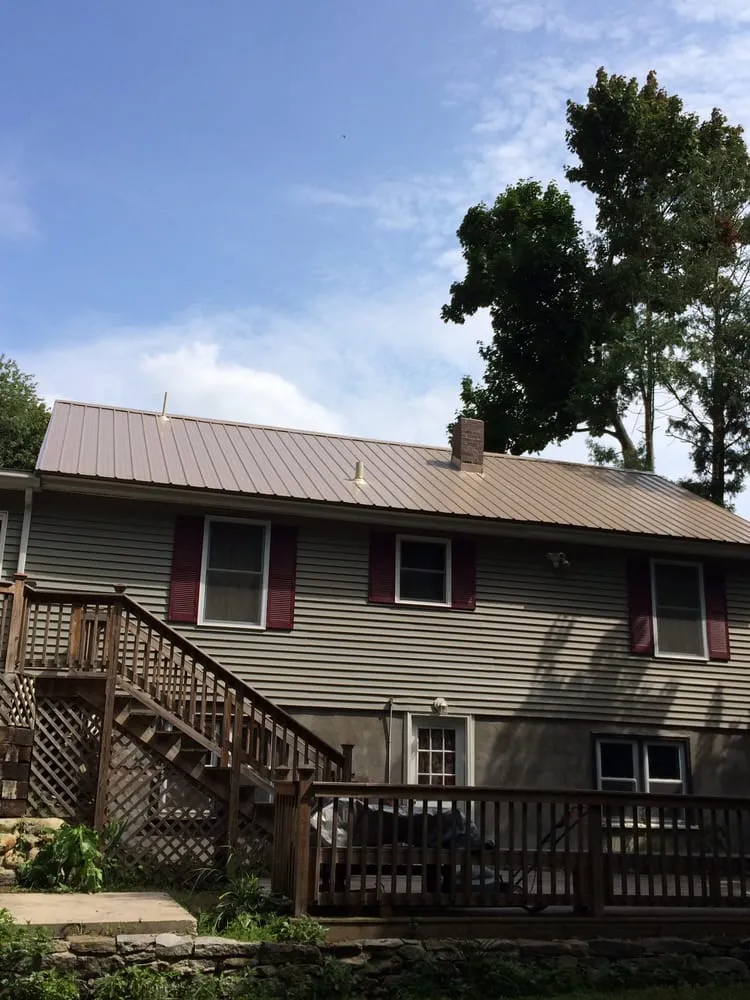 Slide of New Heights Roofing